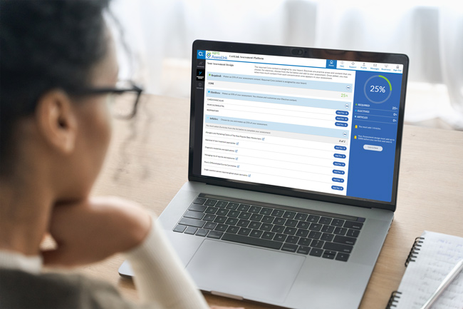 Photo looking over womans shoulder at laptop screen with AssessLink