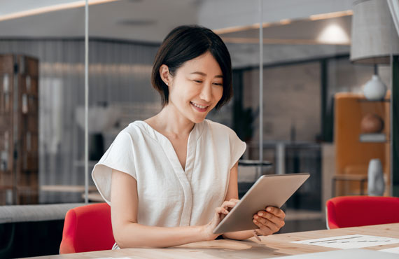 woman looking at a tablet